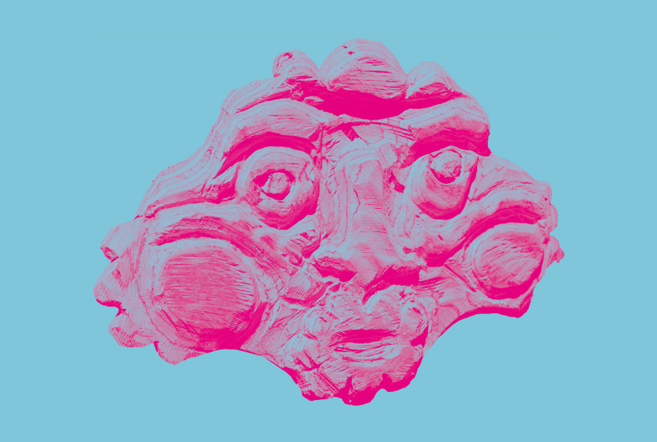 Against a blue background is a masklike sculpture in bright pink. Its carved face has wide cheeks and round eyes.